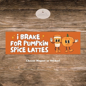 May include: Orange rectangular magnet or sticker with the text "I BRAKE FOR PUMPKIN SPICE LATTES." The design includes a cartoon coffee cup and pumpkin, both with smiling faces and arms. The text "Choose Magnet or Sticker!" is below.