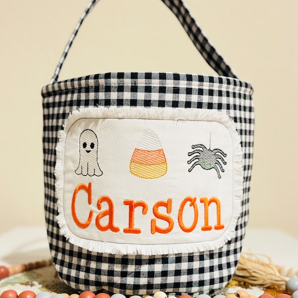 Embroidered Kids Halloween Basket with Personalization makes an excellent Halloween Tote Bag for the Spooky Trick or Treat Fall Season