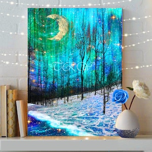 A crescent moon hangs over a wave like snow covered hill of trees while the Northern Lights blaze overhead.