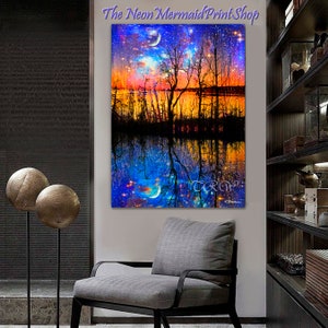 May include: A digital painting of a forest reflected in a lake. The sky above the forest is a vibrant orange and pink with a crescent moon and stars. The reflection in the lake is a deep blue with a crescent moon and stars. The text "The Neon Mermaid Print Shop" is at the top of the image.