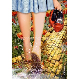 May include: A digital art print featuring a person walking on a golden brick road, holding a pair of red shoes. The scene includes a blue and white gingham skirt, poppies, and the text "NeonMermaidPrints".