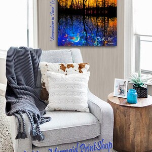 May include: A digital painting of a forest scene with a starry sky and a crescent moon. The forest is reflected in a still body of water. The painting is titled "Somewhere in Time" and is signed by the artist, T. Rowan. The painting is framed and ready to hang.