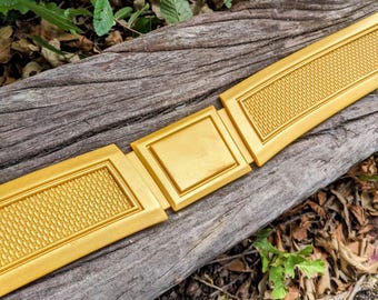 Super-Mammal Birthright Belt & Cape Emblem