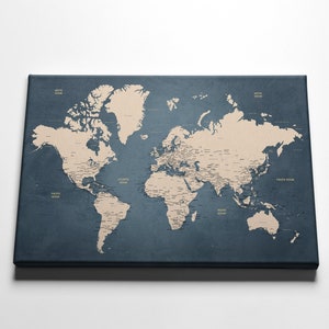 May include: A world map with a blue background and beige continents. The map is printed on canvas and is ready to be used as a push pin travel map.