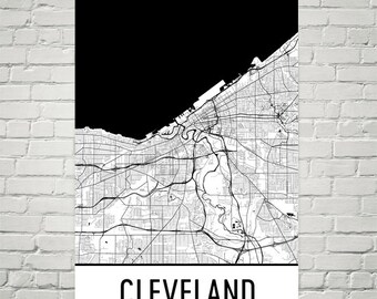 May include: Black and white map of Cleveland, Ohio. The map shows the city's streets, waterways, and neighborhoods. The word "CLEVELAND" is printed in white at the bottom of the map.