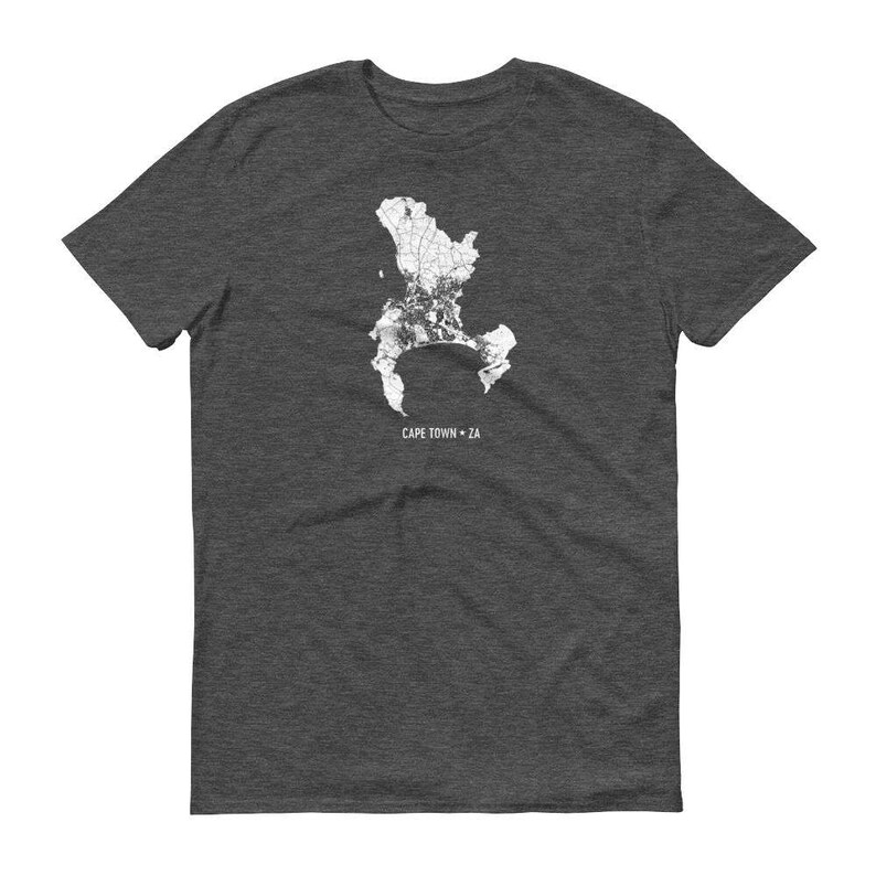 May include: A dark heather grey t-shirt with a white outline of Cape Town, South Africa. The text "CAPE TOWN * ZA" is printed below the outline.