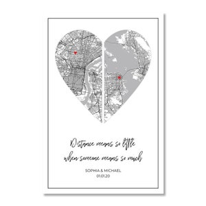 May include: A black and white map of two cities in the shape of a heart. The cities are connected by a line down the middle of the heart. The text "Distance means so little when someone means so much" is below the heart. The names "Sophia & Michael" and the date "01.01.20" are below the text.