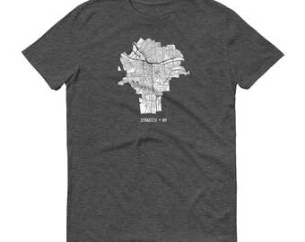 May include: A dark heather grey t-shirt with a white outline of the city of Syracuse, New York. The text "Syracuse, NY" is printed below the city outline.