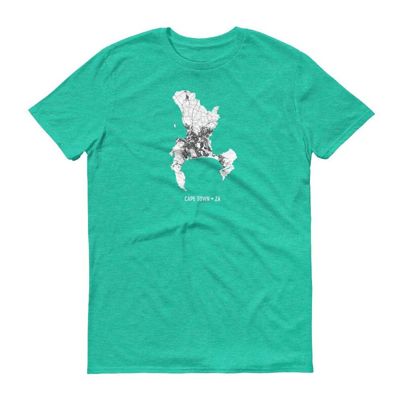 May include: A teal green t-shirt with a white outline of Cape Town, South Africa, and the text "CAPE TOWN - ZA".