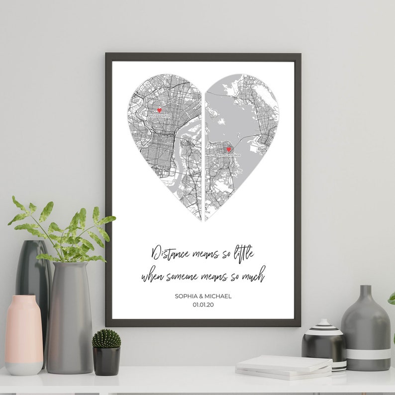 May include: A black and white map of two cities in the shape of a heart with the text "Distance means so little when someone means so much" and the names "Sophia & Michael" and the date "01.01.20".