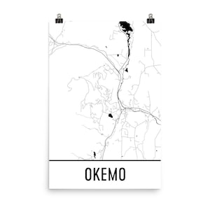 May include: A black and white line art map of Okemo, Vermont. The map shows the roads, lakes, and other geographical features of the area.
