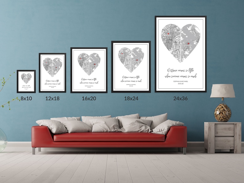 May include: A comparison of different sizes of framed heart-shaped maps with the text "Distance means so little when someone means so much" and the names "Sophia & Michael" printed below the map. The sizes shown are 8x10, 12x18, 16x20, 18x24, and 24x36 inches.