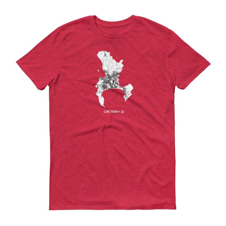 May include: Red t-shirt with a white outline of Cape Town, South Africa, and the text "CAPE TOWN - ZA".