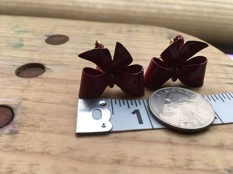metal bows circa 1980s Vintage Red Earrings