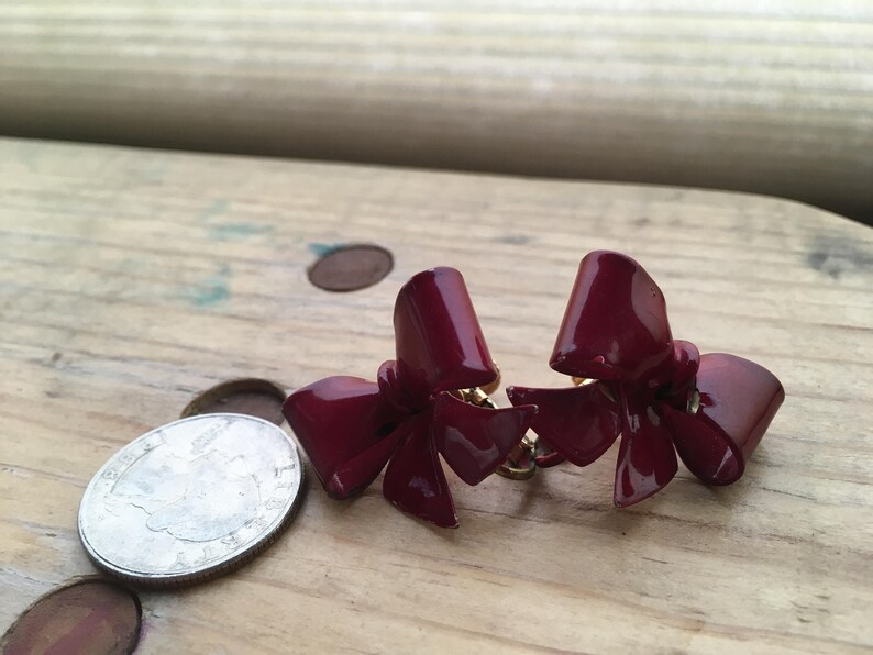 metal bows circa 1980s Vintage Red Earrings