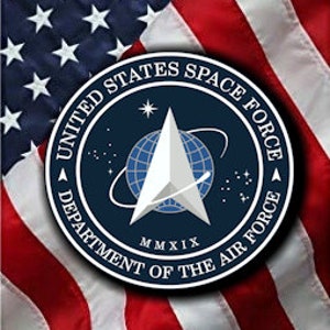 May include: A blue and white seal with the text "United States Space Force Department of the Air Force" and a star with a globe inside. The seal is on a red, white, and blue American flag.