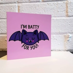 May include: A pink card with a purple bat illustration and the text "I'm Batty For You!"