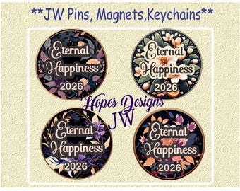 May include: Four round pins or magnets with floral designs and the text "Eternal Happiness 2026". The pins feature a variety of floral arrangements in shades of purple, orange, and white, set against a dark background.