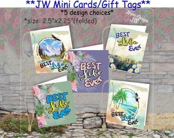 May include: Five different designs of folded gift tags with the text "Best Life Ever" in various colors and fonts. The tags are 2.5 inches by 2.25 inches.