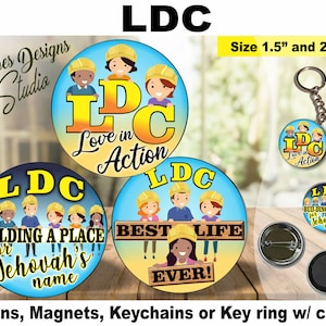 May include: Three different designs of 1.5" and 2.25" round pins, magnets, keychains, and key rings with a clip. The designs feature the acronym "LDC" with the words "Love in Action", "Building a Place for Jehovah's name", and "Best Life Ever!" The pins and keychains feature cartoon images of people wearing hard hats.