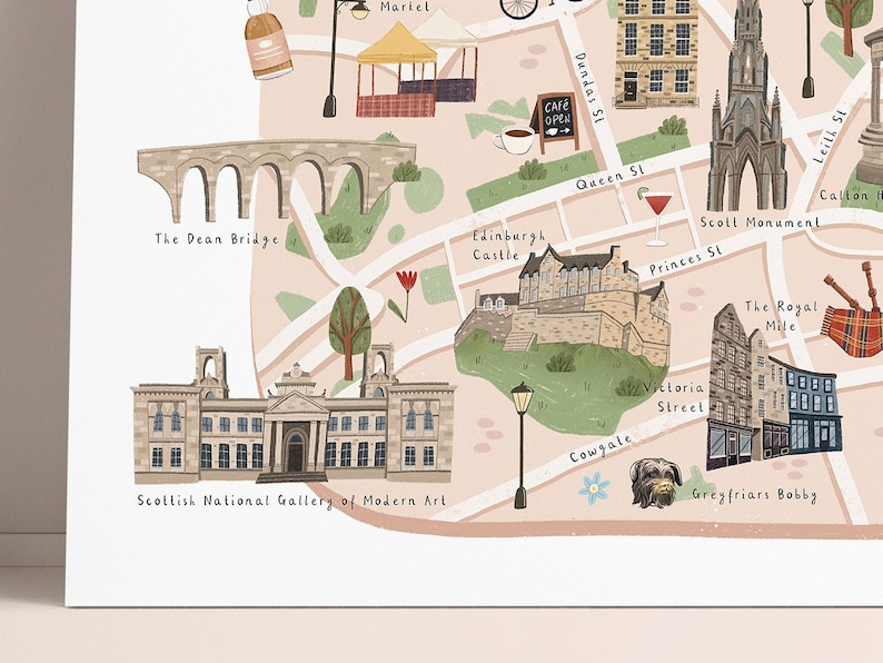 May include: A colorful illustrated map of Edinburgh, Scotland, featuring landmarks like Edinburgh Castle, The Dean Bridge, and Greyfriars Bobby. The map includes text labels for each location, as well as small illustrations of local attractions.