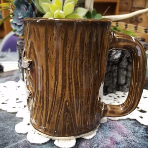 Woodgrain Brown Handmade pottery mug with Plaid Deer
