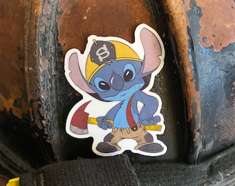 May include: A blue cartoon character wearing a yellow firefighter helmet with a black letter 'S' on it. The character is holding a red axe and is standing on a brown and black firefighter helmet.