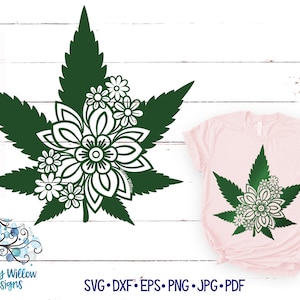 May include: A green marijuana leaf with white flowers in the centre. The image is a digital design for a t-shirt or other craft project. SVG, DXF, EPS, PNG, JPG, PDF.