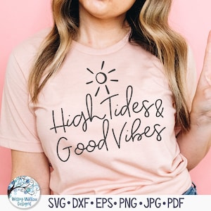 May include: A pink t-shirt with the text "High Tides & Good Vibes" in black script. A simple sun graphic is above the text.