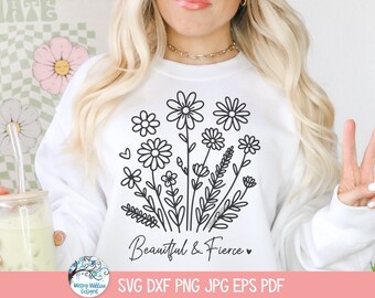 May include: A white sweatshirt with a black line drawing of flowers and the text "Beautiful & Fierce" on the front.