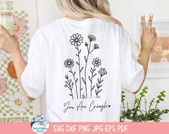 Pode incluir: Camiseta branca com um desenho de flores em linha preta e o texto "You Are Enough" nas costas.