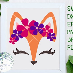 May include: A digital illustration of a fox face with closed eyes and a flower crown. The fox is orange with a white face and brown eyelashes. The flower crown is made of pink and purple flowers.
