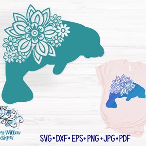 May include: Teal blue manatee silhouette with white floral design on top. The manatee is on a white wood background. The image also shows a pink t-shirt with a blue manatee silhouette with white floral design on top. The text "SVG - DXF - EPS - PNG - JPG - PDF" is at the bottom of the image.