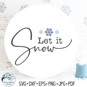 May include: A circular white sign featuring the dark gray text Let it Snow in a cursive and print font combination. Three light blue snowflakes are positioned above the text. The file formats SVG, DXF, EPS, PNG, JPG, and PDF are listed below.