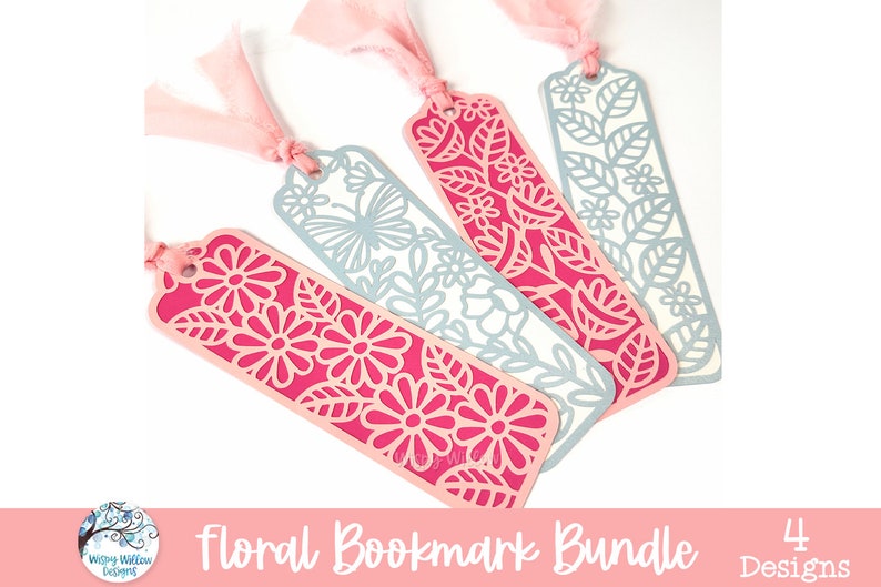 May include: A set of four rectangular bookmarks featuring intricate laser-cut floral and butterfly patterns. Two bookmarks are in vibrant pink and two are in light blue. Each bookmark has a hole at the top with a tied light pink fabric ribbon.