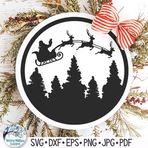 Round Christmas Sign SVG for Cricut, Reindeer and Santa Sleigh Flying Over Trees, Christmas Forest Skyline, Silhouette Vinyl Decal Cut File