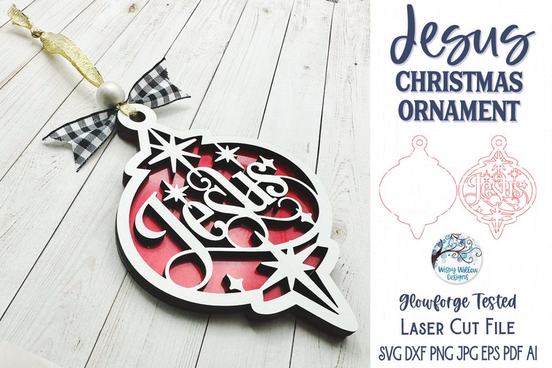 May include: A layered Christmas ornament featuring a black cutout frame with the word Jesus and star shapes over a solid red background. It includes a white bead, a black and white buffalo check ribbon, and a gold ribbon loop for hanging.