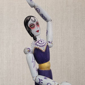 Witchy room decor, articulated wooden doll.