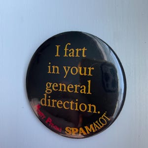 May include: A rustic wooden sign with the text "Welcome to our home" in white lettering. The sign features a distressed finish and a simple, inviting design, perfect for front door decor.