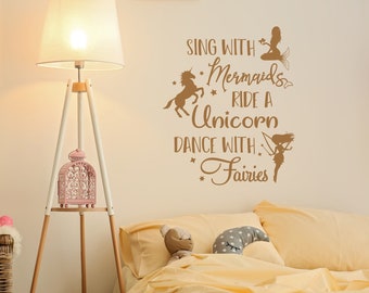 May include: A brown wall decal with the text "Sing with Mermaids, Ride a Unicorn, Dance with Fairies". The decal features a mermaid, unicorn, and fairy.