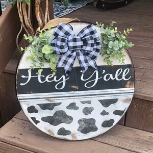 18” round door hanger / 1” thick / front door sign / cow print door hanger / porch sign / welcome  sign / farmhouse sign / hey y’all