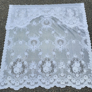 Vintage lace curtain panel with wave on the bottom and double top part