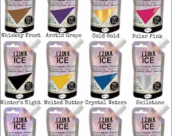 May include: A collection of 14 Izink Ice paint colours in squeeze bottles. The colours include Glacier Green, Frostbite, Freezia, Cool Copper, Whiskey Frost, Arctic Grape, Cold Gold, Polar Pink, Winter's Night, Melted Butter, Crystal Waters, Hailstone, Slurpee, Snowball, Greenland, Iced Coffee, Green Peas, and Iced Tea.