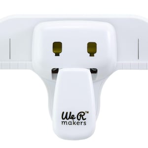 May include: A set of three ceramic mugs with a speckled, matte finish. The mugs are in shades of cream, light gray, and dark gray. Each mug has a simple, minimalist design, perfect for coffee or tea.