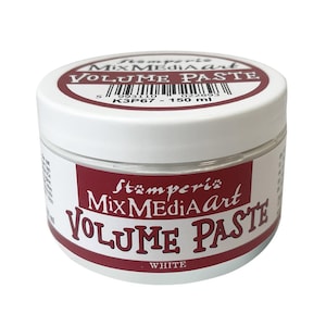 May include: A white jar of white volume paste for mixed media art. The jar has a red label with the text "Stämperi Mix MediAart VOLUME PASTE WHITE" on it. The jar is 150 ml.