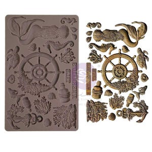 May include: A mermaid's tale silicone mold with a mermaid, a ship's wheel, seahorses, coral, and other nautical elements. The mold is brown and has the words "A Mermaid's Tale" written on it.