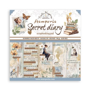 Puede incluir: Un bloc de scrapbooking Secret Diary con estética vintage. La portada presenta un retrato de mujer, una mariposa y el texto "Create Happiness". El bloc contiene hojas de doble cara, cada una de 20,3x20,3 cm.