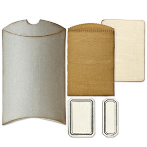 May include: A collection of paper craft supplies, including a large gray envelope, a brown textured pocket, a cream-colored card, and two cream-colored labels with black borders. The items have a textured paper finish.