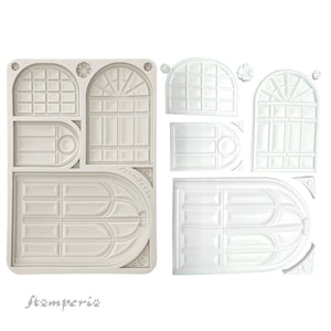 May include: A white silicone mold with multiple designs of arched windows. The mold is for making cake decorations or other edible crafts.