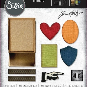 Puede incluir: Juego de troqueles Sizzix Thinlits con varias formas, incluyendo un corazón, un óvalo, un escudo y una caja. El conjunto incluye el texto "10 DIES | 10 MATRICES | 10 TROQUELES | 10 FUSTELLE | 10 ВЫРУБКИ | 10 STANZEN | 10 CORTANTES".